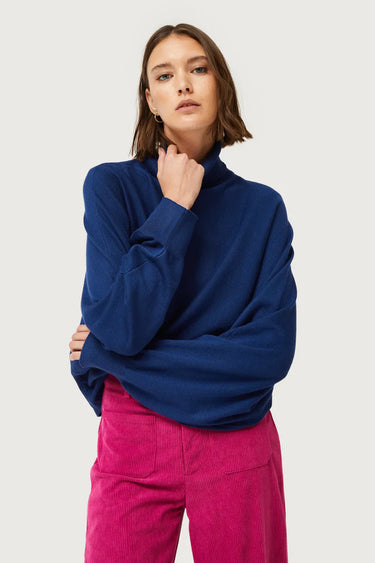 Navy blue turtleneck knitted sweater