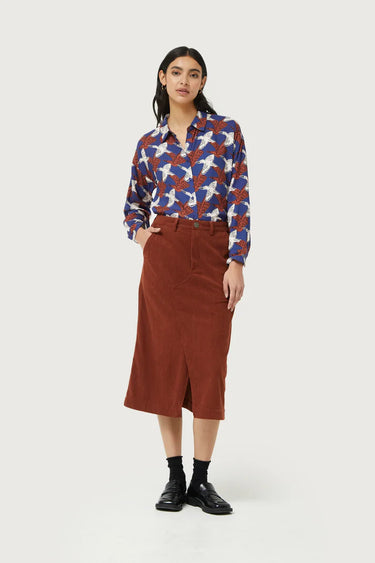 Navy blouse with brown and white birds