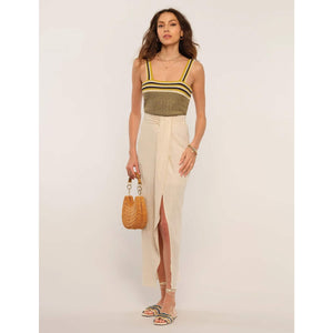 The Catriona Skirt is made of airy linen and is slim-fitting with a side slit to show some skin. It has a zipper closure and elasticized back for easy wear. Pair it with a knit cami or layer over your favorite swimwear. 